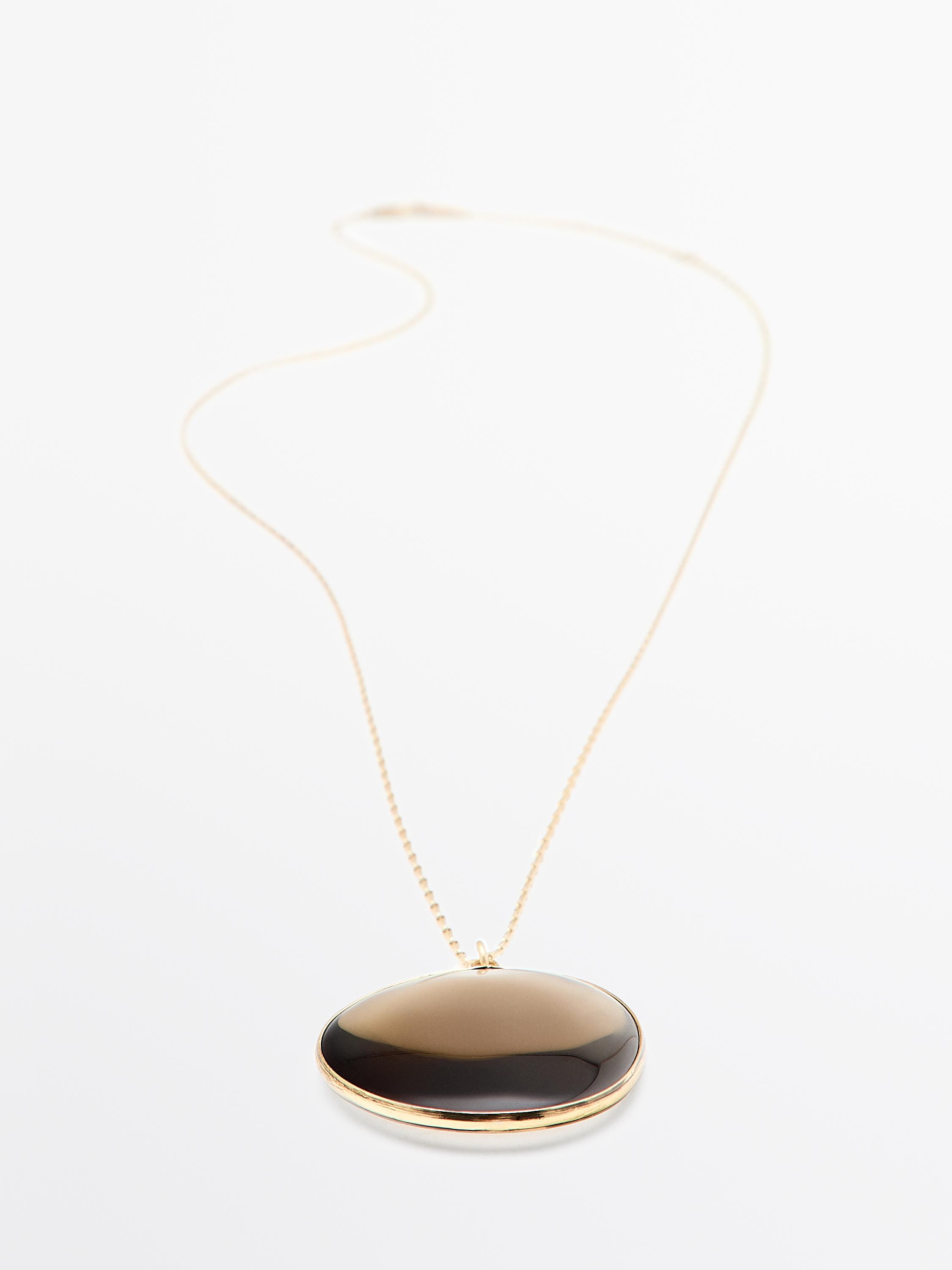 Necklace with translucent stone pendant